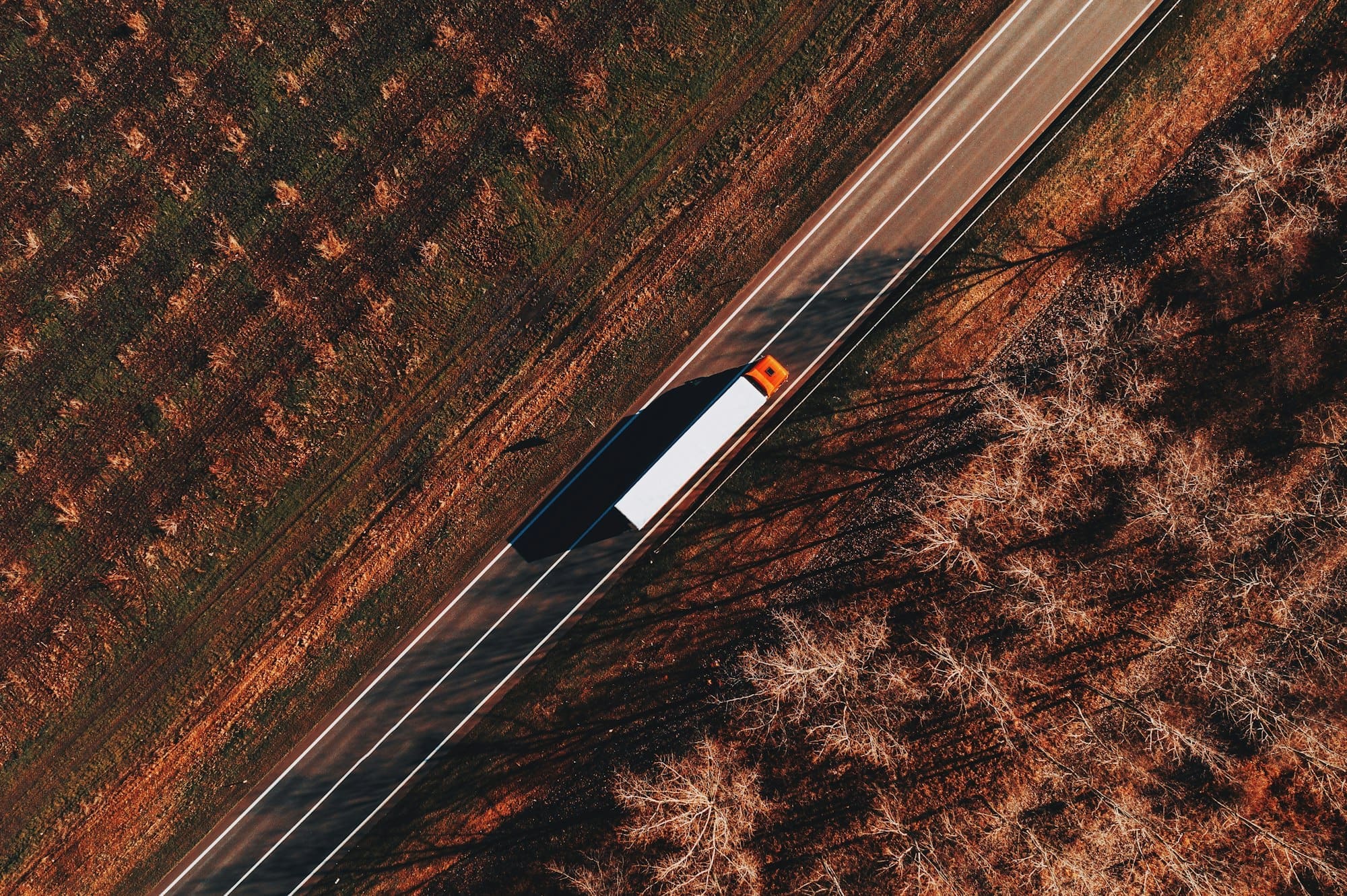 Semi-truck on the road from above